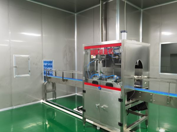 桶装水割膜拔盖一体机